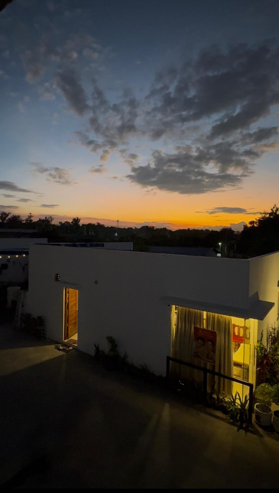 Hotel Tugatog illuminated exterior at dusk